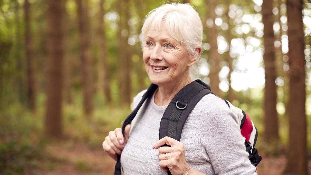 An older adult relaxing in the nature